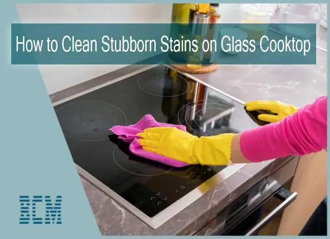 How do you remove stubborn stains from a glass top stove?
